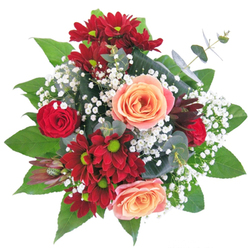 This elegant arrangement exudes both sophistication and warmth, a testament to the florists' artistry honed in Alperton's vibrant community. The base of the bouquet features lush, deep red chrysanthemum and rose blooms, striking in their velvety intensity and reminiscent of the dazzling sunsets watched from the Grand Union Canal Path. Resting among these are creamy apricot and blush-pink roses, their soft petals like delicate strokes of paint adding gentle warmth and light. Wispy gypsophila interlaces between the larger blossoms, casting a pearlescent glow over the whole arrangement, as if imitating the sparkle of morning dew on grass at Heather Park. Set in a clear, rounded glass vase, each detail-from supple petals to verdant leaves-invites touch and admiration. The variety of textures, the interplay of colours, and the precision with which every flower sits all hint at the skill and dedication of Alperton's florists. This bouquet is perfectly suited for both grand occasions and intimate moments, infusing any Alperton gathering with style and emotion. Whether adorning a table at an Ealing Road celebration or offered as a token of affection, it expresses a warmth that is both deeply personal and unmistakably local.